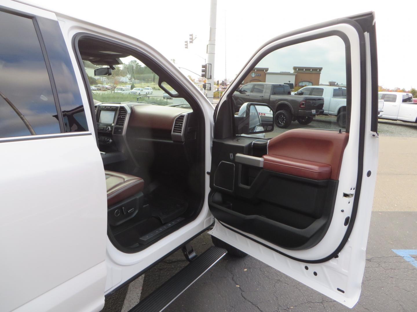 2019 White /BLACK INT W/DARK MARSALA LT Ford F-150 Platinum SuperCrew Cab 4WD (1FTEW1E45KF) with an 3.5L V6 ECOBOOST engine, 10-SPEED AUTO W/TOW MO transmission, located at 2630 Grass Valley Highway, Auburn, CA, 95603, (530) 508-5100, 38.937893, -121.095482 - F150 Platinum featuring a level kit, Fuel Offroad wheels, Toyo AT2 tires, Barricade Front winch bumper, Smittybilt winch, LED light bar, Undercover Ultraflex bedcover, and a Cargo Glide bed system. - Photo#51